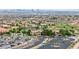 An aerial view showcasing the city skyline and the meticulously landscaped community at 2571 Thatcher Ave, Henderson, NV 89052