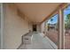 Covered patio overlooking the backyard's desert landscaping at 2571 Thatcher Ave, Henderson, NV 89052