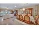 A combined living and dining space with seating for eight at 2571 Thatcher Ave, Henderson, NV 89052