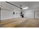 Spacious and clean garage with ample room for parking and storage, featuring neutral walls at 2621 Ground Robin Dr, North Las Vegas, NV 89084