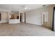 Open living area showcasing tile floors and seamless flow into adjacent rooms at 2621 Ground Robin Dr, North Las Vegas, NV 89084