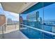 Relaxing on the balcony with panoramic city vistas at 2700 Las Vegas Blvd # 2303, Las Vegas, NV 89109
