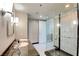 Bright bathroom featuring a glass-enclosed shower, sleek vanity, and modern lighting at 2700 Las Vegas Blvd # 2303, Las Vegas, NV 89109
