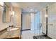 Bright bathroom with glass shower and marble vanity at 2700 Las Vegas Blvd # 2303, Las Vegas, NV 89109