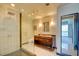 Spa-like bathroom with marble shower, modern vanity, and glass shower door at 2700 Las Vegas Blvd # 2303, Las Vegas, NV 89109