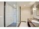 Modern bathroom featuring a glass-enclosed shower and double sink vanity at 2700 Las Vegas Blvd # 2303, Las Vegas, NV 89109
