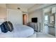 Bedroom with a large TV, well-made bed, and modern nightstands at 2700 Las Vegas Blvd # 2303, Las Vegas, NV 89109