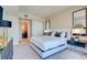 Spacious bedroom with king bed, modern furnishings, and ample natural light at 2700 Las Vegas Blvd # 2303, Las Vegas, NV 89109