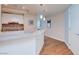 Kitchen with gray countertops, sleek white cabinets and stainless steel appliances at 2700 Las Vegas Blvd # 2303, Las Vegas, NV 89109