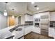 Modern kitchen features stainless steel appliances and sleek white cabinetry at 2700 Las Vegas Blvd # 2303, Las Vegas, NV 89109