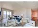 Open-concept space with a stylish living room flowing into a dining area with city views at 2700 Las Vegas Blvd # 2303, Las Vegas, NV 89109