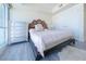 Cozy bedroom featuring light floors, a unique headboard and natural light at 2700 Las Vegas Blvd # 2809, Las Vegas, NV 89109