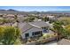 A well maintained backyard with desert landscaping, a covered patio and view of the surrounding mountains at 2862 Sapphire Desert Dr, Henderson, NV 89052