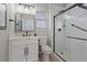 Updated bathroom features a glass-enclosed shower and modern fixtures at 2862 Sapphire Desert Dr, Henderson, NV 89052