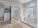 Spa-like bathroom features a walk-in shower, closet and elegant fixtures at 2862 Sapphire Desert Dr, Henderson, NV 89052