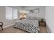 Charming bedroom with a unique patterned bedspread and a bright, airy feel at 2862 Sapphire Desert Dr, Henderson, NV 89052