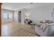 Spacious living room with hardwood floors, modern decor, and double door entryway at 2862 Sapphire Desert Dr, Henderson, NV 89052