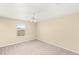 Neutral bedroom featuring carpet flooring, a ceiling fan, and a window at 3049 Historic Horizon Ave, Henderson, NV 89044