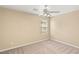A neutral bedroom has carpet flooring, a ceiling fan, and a window at 3049 Historic Horizon Ave, Henderson, NV 89044