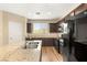Modern kitchen featuring granite countertops, a large island, and stainless steel appliances at 3049 Historic Horizon Ave, Henderson, NV 89044
