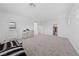 Expansive bedroom features natural light, carpet floors, and access to both a walk-in closet and a private patio at 31 Strada Loreto, Henderson, NV 89011