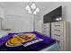 Bedroom with a window and closet, with a flat screen TV on a dresser at 31 Strada Loreto, Henderson, NV 89011
