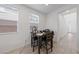 Cozy dining area with a table and chairs, and bright natural light from windows at 31 Strada Loreto, Henderson, NV 89011