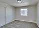 Bedroom with neutral carpet, a window for natural light, and closet with sliding doors at 3330 Rio Grande St, Las Vegas, NV 89115