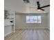 Open dining area featuring natural light, hardwood flooring and floating shelves at 3330 Rio Grande St, Las Vegas, NV 89115