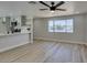 Bright dining area with new wood flooring, natural light, and modern kitchen at 3330 Rio Grande St, Las Vegas, NV 89115