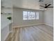 Open dining area featuring natural light, hardwood flooring and floating shelves at 3330 Rio Grande St, Las Vegas, NV 89115