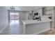 Modern kitchen with stainless steel appliances and slider to the backyard at 3330 Rio Grande St, Las Vegas, NV 89115