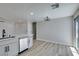 Spacious living room features wood flooring and sliding glass doors to access the backyard at 3330 Rio Grande St, Las Vegas, NV 89115