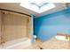 Bright bathroom featuring a shower and tub combination, tiled flooring, and a vanity with a sink at 3719 Centennial Cir, Las Vegas, NV 89121