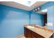 Bright bathroom with a vanity, mirror, and neutral wall paint at 3719 Centennial Cir, Las Vegas, NV 89121