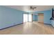 Large bedroom with ceiling fan, closet and wood-look floors at 3719 Centennial Cir, Las Vegas, NV 89121