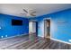Bedroom with laminate floors, ceiling fan, and closet at 3719 Centennial Cir, Las Vegas, NV 89121