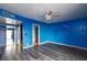 Bedroom featuring laminate floors and double sliding closet doors at 3719 Centennial Cir, Las Vegas, NV 89121