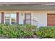 Home featuring mature landscaping, an inviting front entrance, and security door at 3719 Centennial Cir, Las Vegas, NV 89121