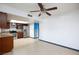 The kitchen features stainless steel appliances, wood cabinets, and an eat-in dining space at 3719 Centennial Cir, Las Vegas, NV 89121