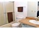 Bathroom featuring a shower with sliding doors, toilet, and a single sink vanity with a mirror at 3740 Desert Marina Dr # 11, Laughlin, NV 89029
