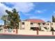 Laughlin Bay Village condo with desert landscaping, red tile roof, and stucco facade at 3740 Desert Marina Dr # 11, Laughlin, NV 89029