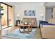 Cozy living room featuring a sliding glass door to the patio and comfortable seating at 3740 Desert Marina Dr # 11, Laughlin, NV 89029