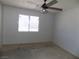 View of bedroom featuring ceiling fan and window at 3890 Terrazzo Ave, Las Vegas, NV 89115