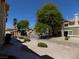 Desert landscaping with walkways around the exterior of an apartment building on a sunny day at 3890 Terrazzo Ave, Las Vegas, NV 89115