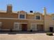 Two-story townhome with stucco and large windows, offering a comfortable living space at 3890 Terrazzo Ave, Las Vegas, NV 89115