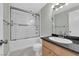 Bathroom with shower-tub combo, vanity, sink, and modern fixtures at 3930 University Center Dr # 202, Las Vegas, NV 89119