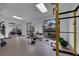 Well-equipped gym showcasing free weights, punching bag, and mirrored walls for a complete fitness experience at 3930 University Center Dr # 202, Las Vegas, NV 89119