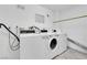 Community laundry room featuring multiple washing machines and dryers at 3930 University Center Dr # 202, Las Vegas, NV 89119