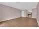 Expansive living room with hardwood floors and adjacent bathroom at 3930 University Center Dr # 202, Las Vegas, NV 89119